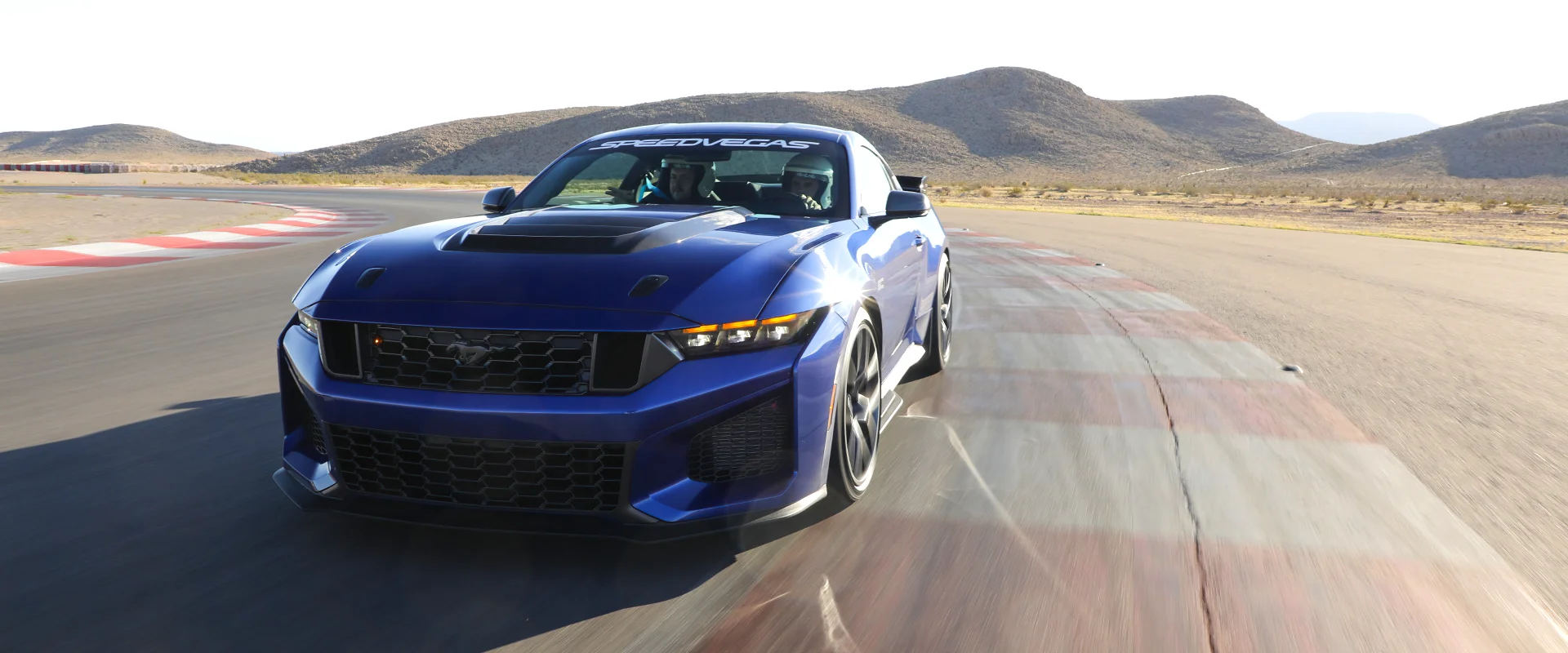 Ford Mustang Dark Horse SC head-on with the desert mountains behind