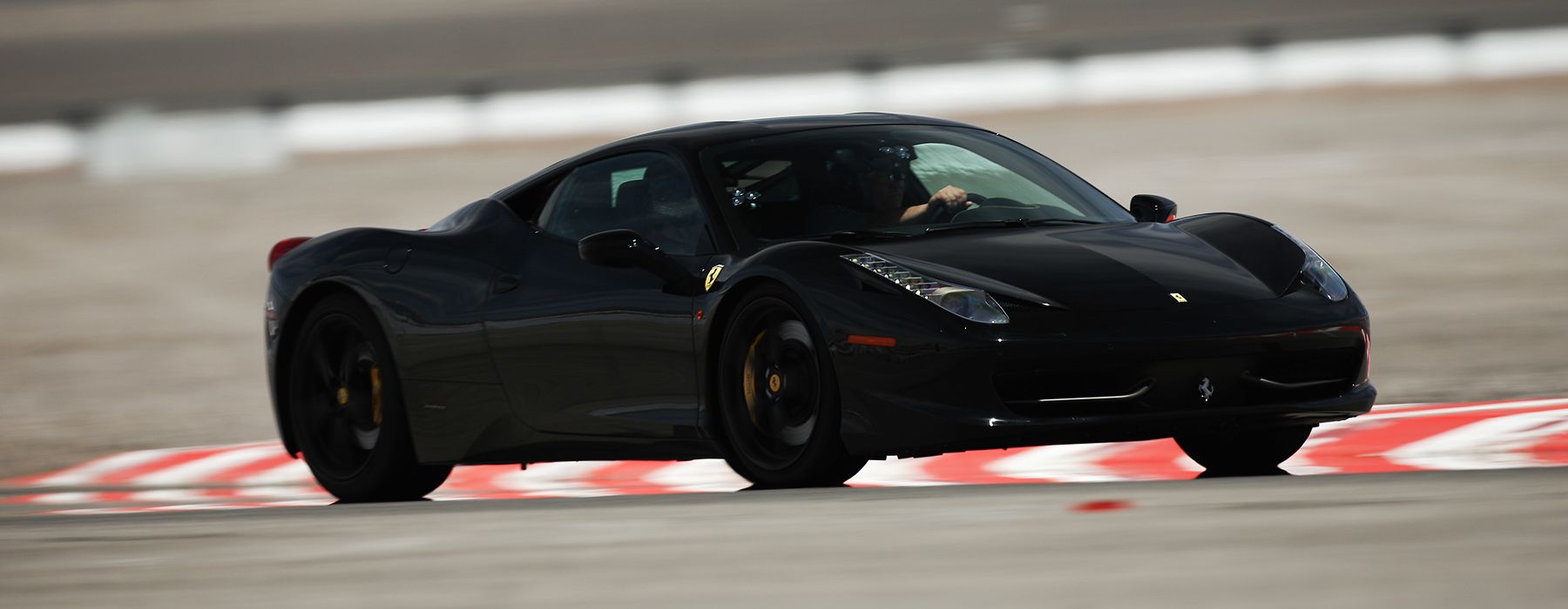 Drive A Ferrari Supercar On A Professional Racetrack With